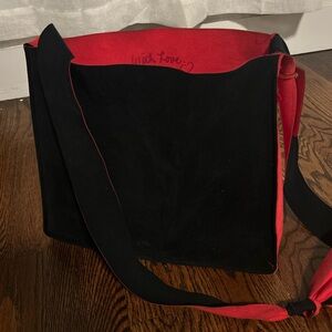 Red and black suede messenger bag
